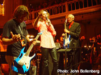 Vai with De Cloet (left) and Bakker, presenting his guitars to each (photo: © John Bollenberg)